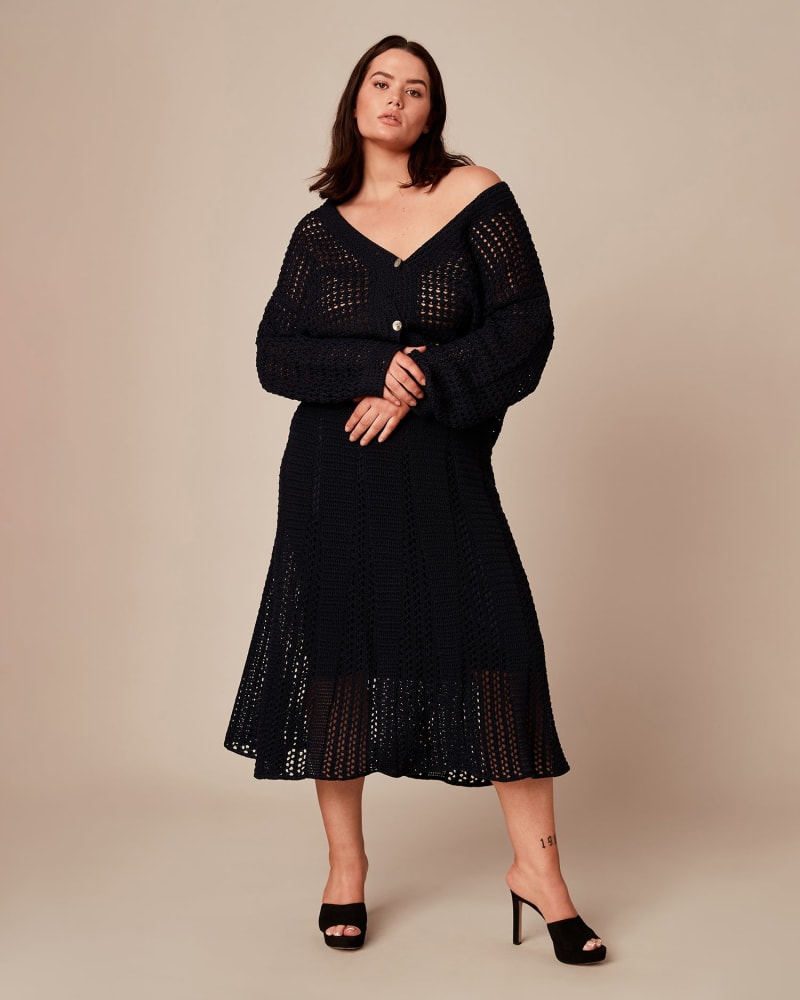 Front of a model wearing a size 3X Crochet Skirt in NAVY by Vince. | dia_product_style_image_id:226865
